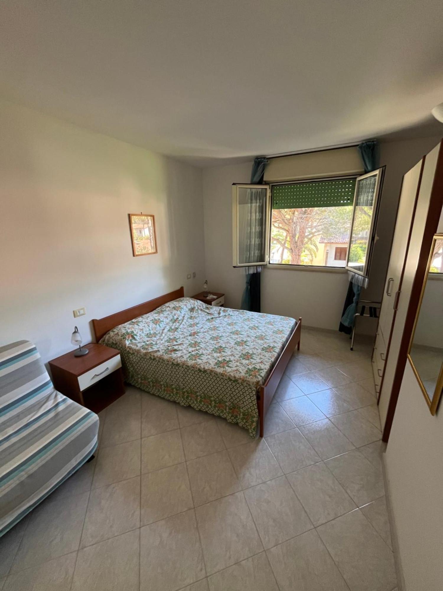 Residence Verde Pineta Principina a Mare Pokoj fotografie