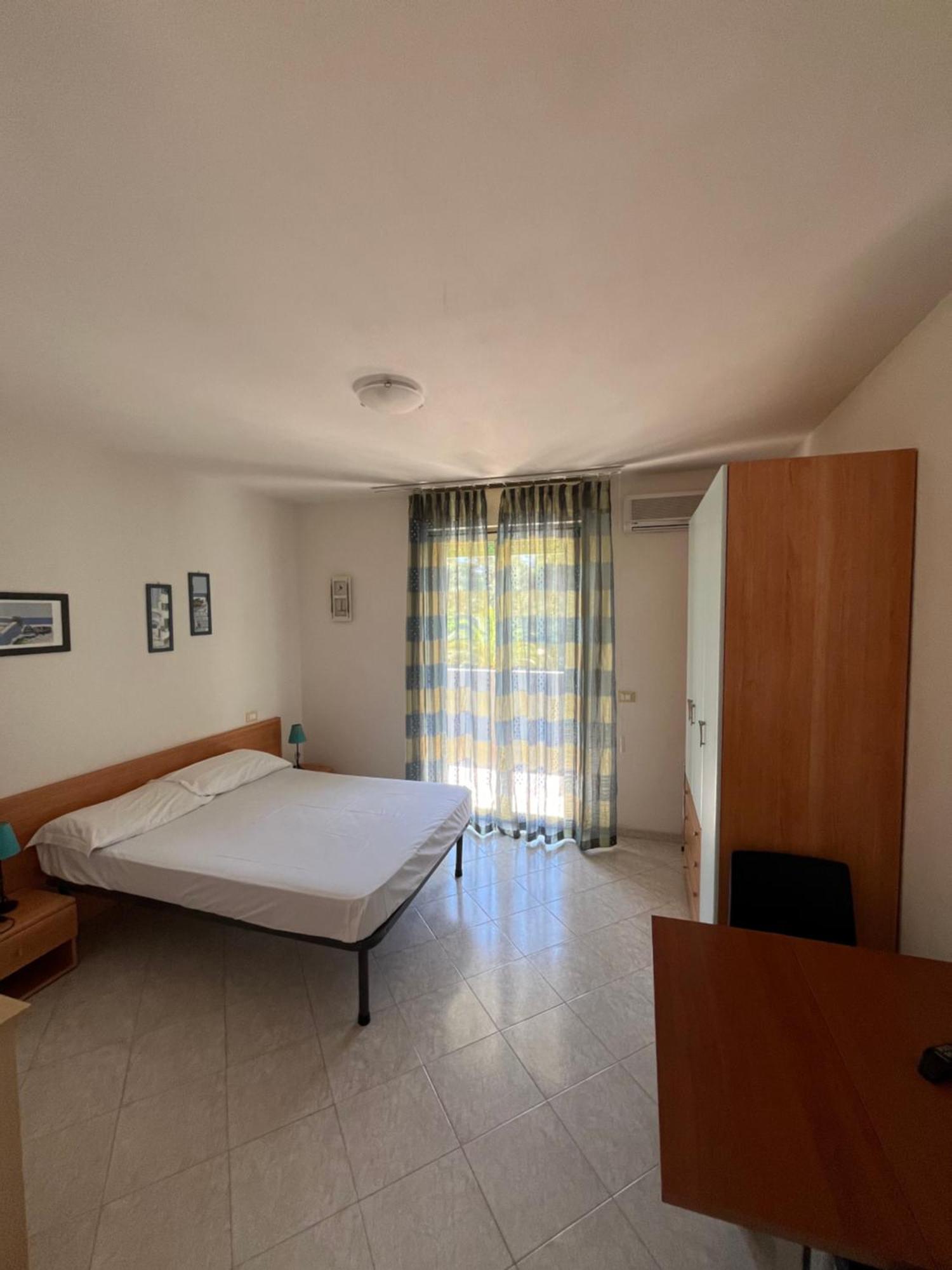 Residence Verde Pineta Principina a Mare Pokoj fotografie